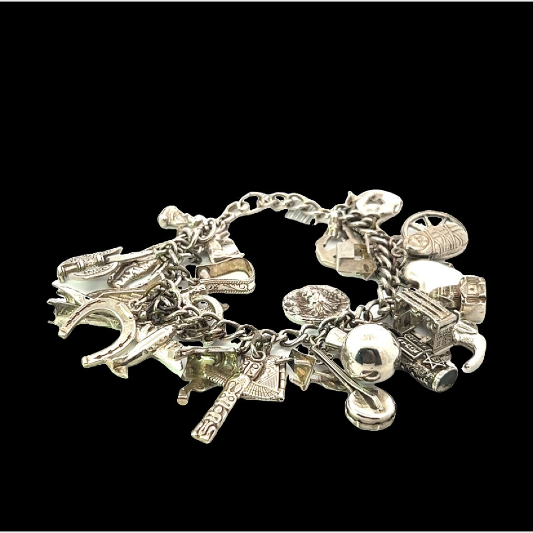 Vintage Sterling Silver 17 Charm Bracelet