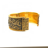 Um extraordinário bracelete de ouro e aço 22 quilates