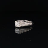 Eighteen Carat White Gold And Square Cut Diamond Ring