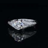 Eighteen Carat White Gold Diamond Ring with Scrolled Shoulders